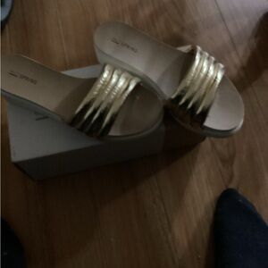 Gold coloured sandals, size 7
By call it spring